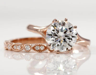 rose gold moissanite diamond ring and wedding band