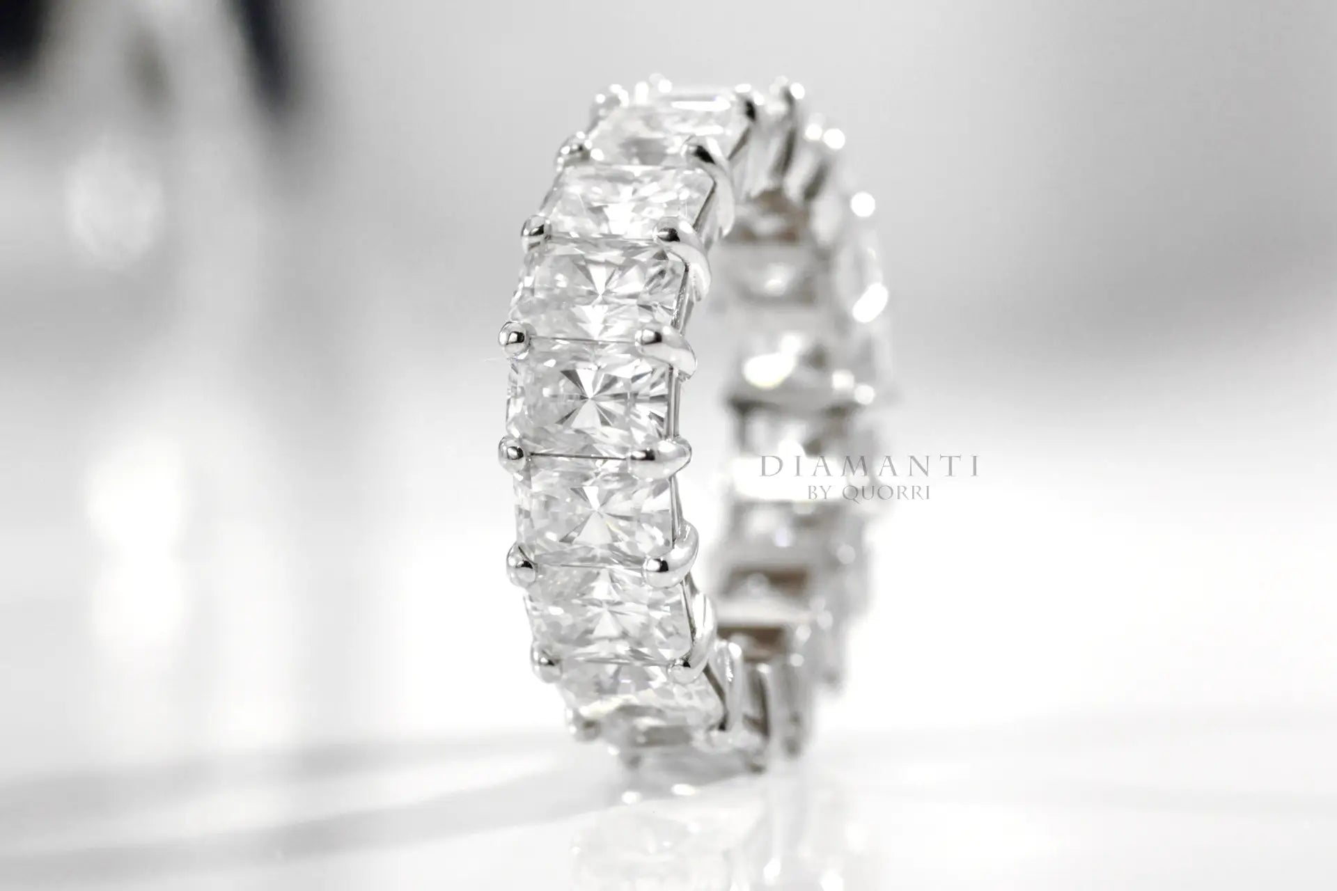 designer platinum 4 carat radiant cut lab diamond eternity anniversary and wedding ring Quorri Canada