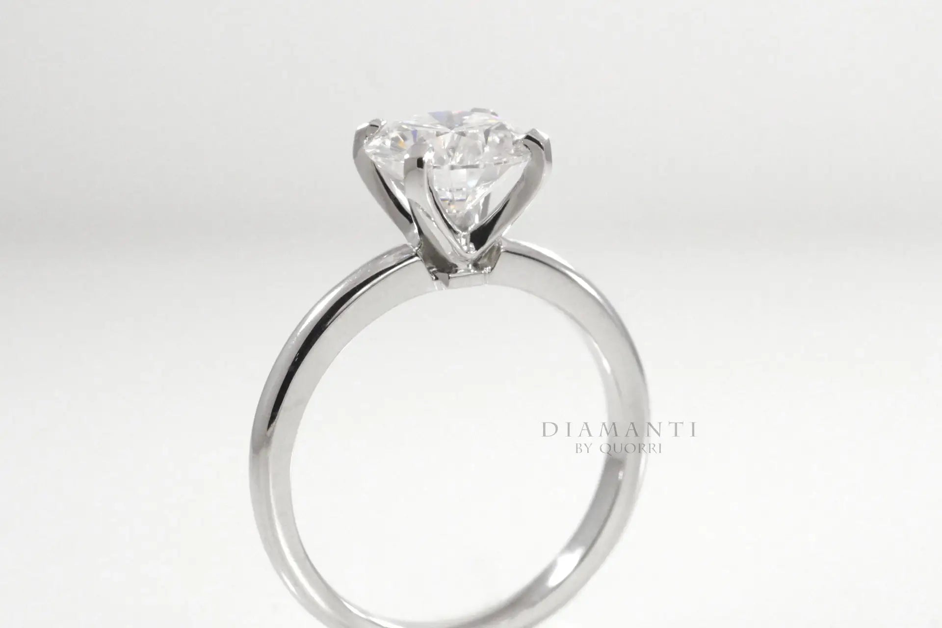 designer 4 prong 18k yellow gold round lab grown diamond engagement ring Quorri