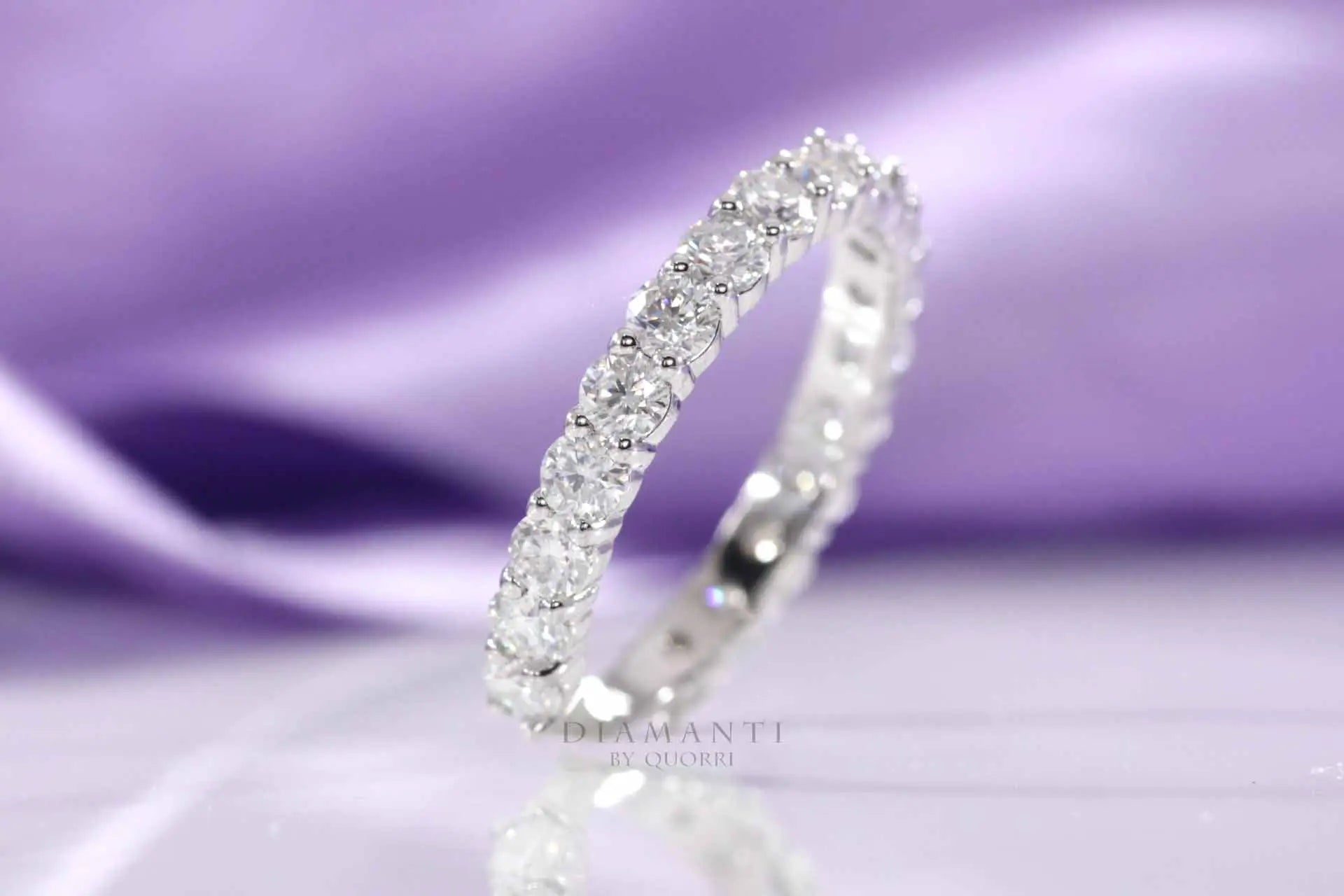 affordable white gold shared prong 2 carat round brilliant lab diamond wedding band Quorri