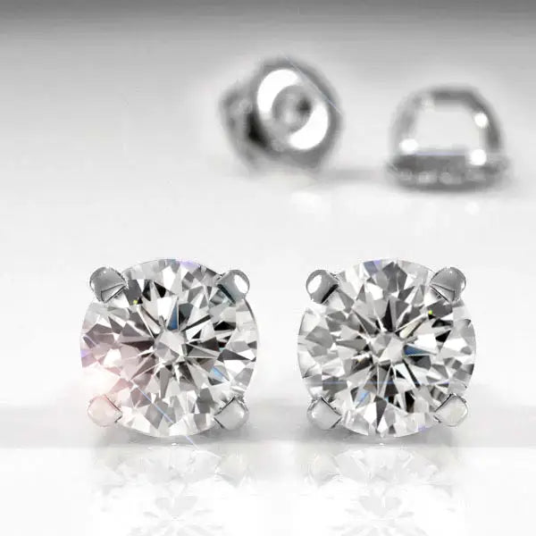 white gold and platinum round lab diamond stud earrings Quorri