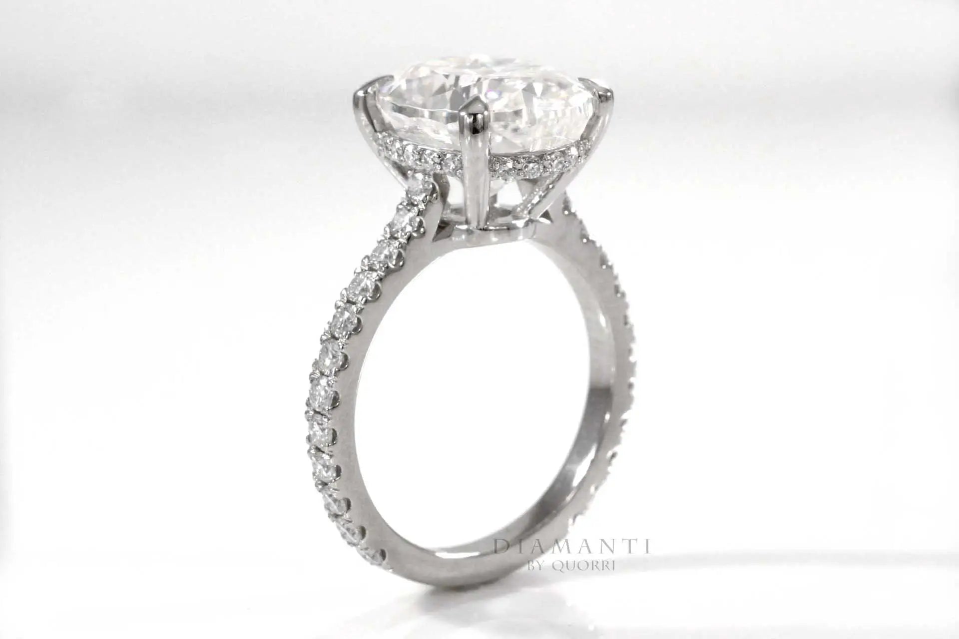 designer hidden halo claw prong 4 carat oval lab grown diamond engagement ring Quorri Canada