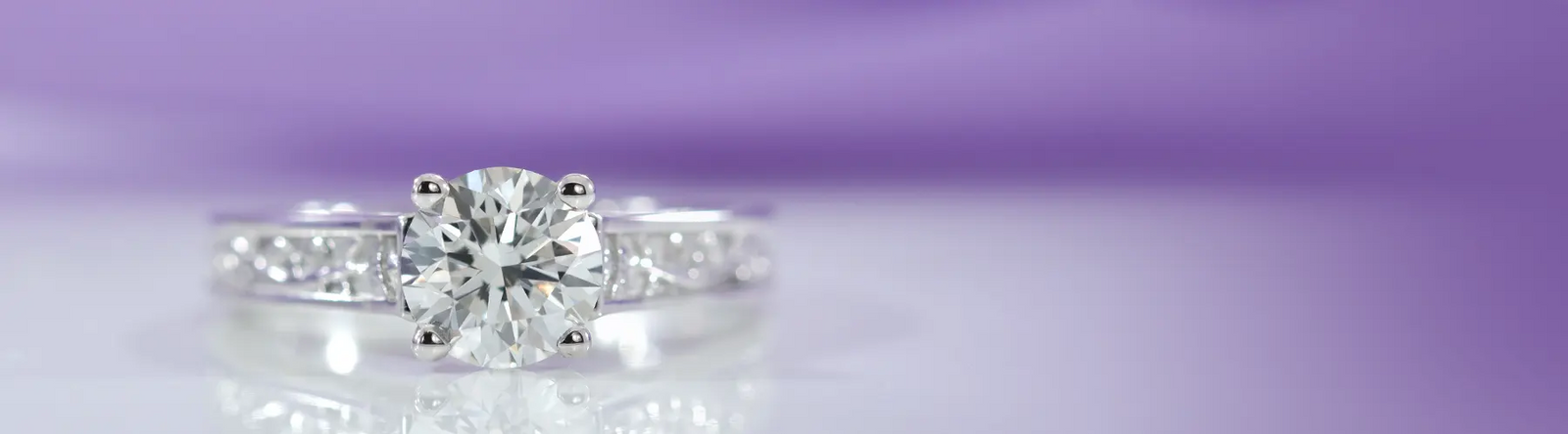 2 carat round accented hidden halo lab grown diamond ring in 18k white gold Quorri