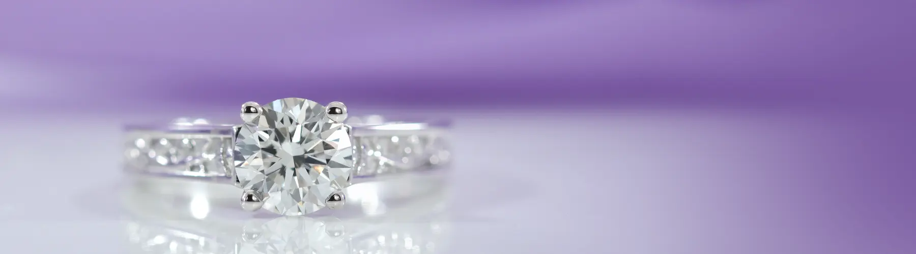 2 carat round accented hidden halo lab grown diamond ring in 18k white gold Quorri
