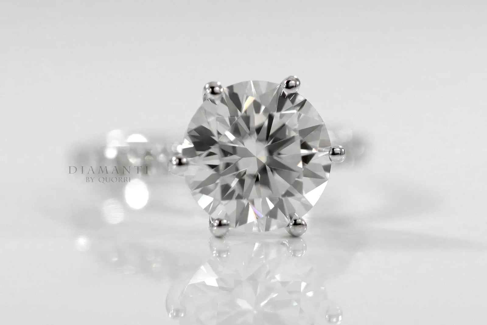 platinum affordable six prong round accented lab diamond engagement ring 