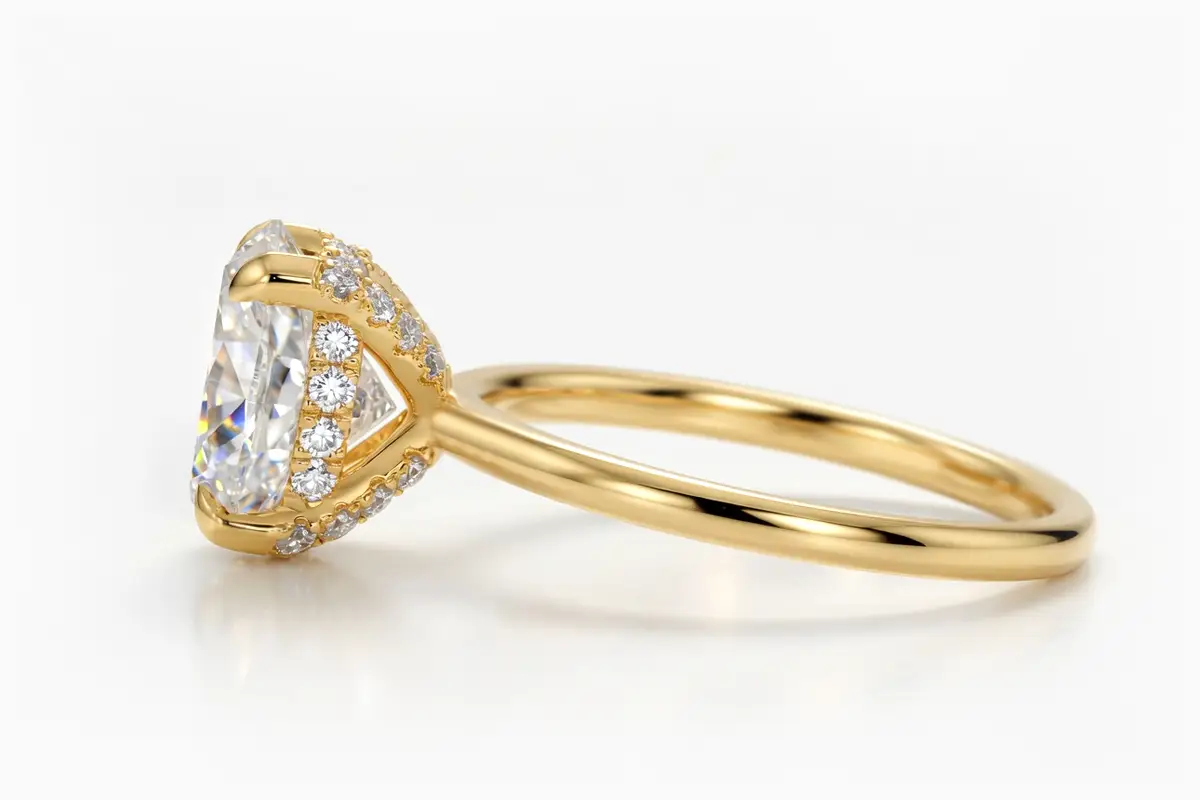 oval accented basket yellow gold engagement ring by Quorri