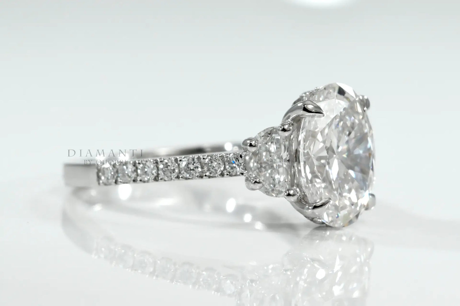 claw prong accented 14k white gold 3 carat oval and moon cut lab grown diamond engagement ring Quorri Canada
