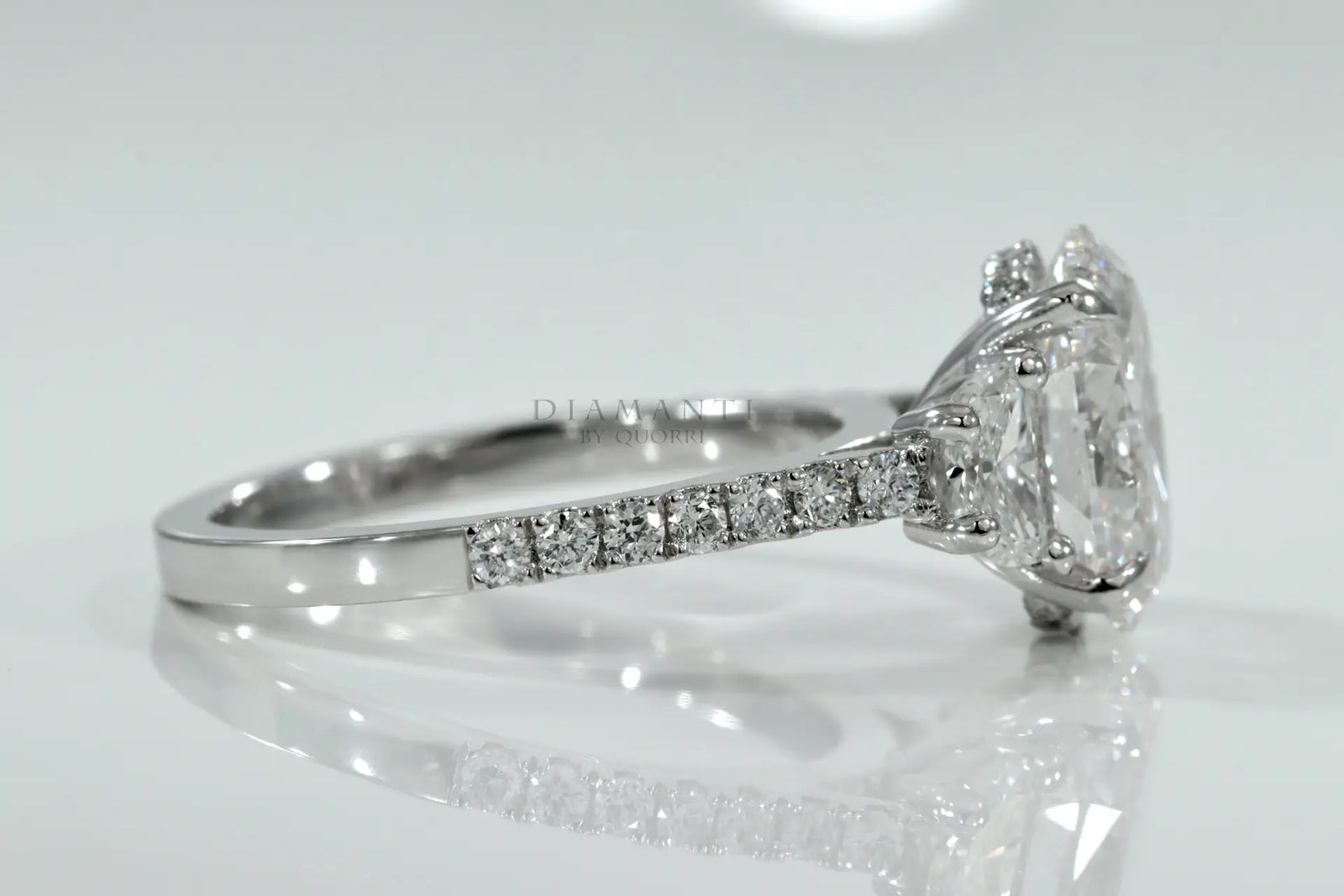 Platinum 4 claw prong 4 carat oval and moon cut lab grown diamond engagement ring Quorri Canada