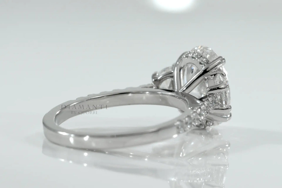 designer claw prong 18k white gold 4 carat oval and moon cut lab created diamond engagement ring Quorri Canada