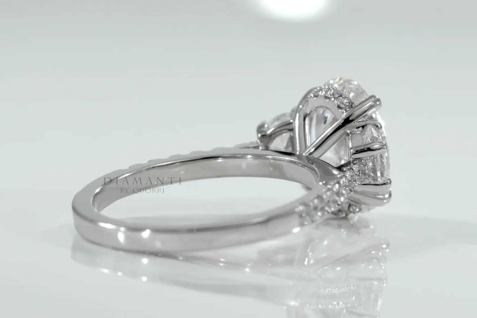 designer claw prong 18k white gold 4 carat oval and moon cut lab created diamond engagement ring Quorri Canada