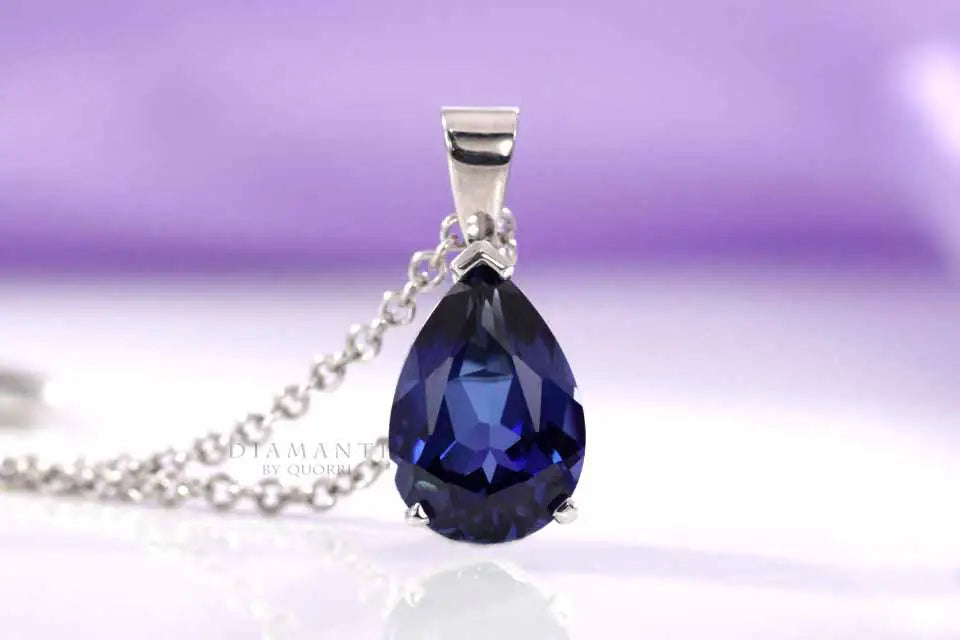 14k white gold solitaire cultured blue sapphire pear pendant Quorri