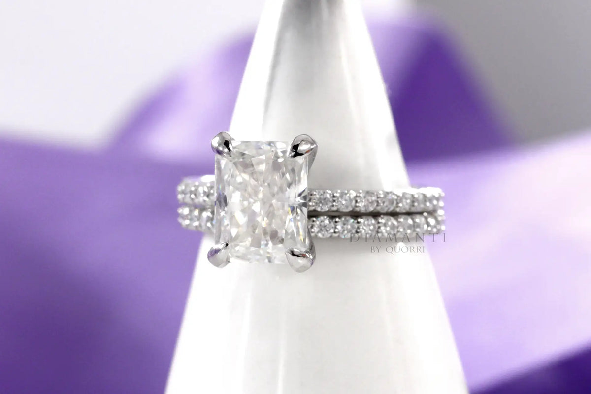 affordable platinum and 18k white gold affordable designer round accented lab diamond wedding ring and band Quorri