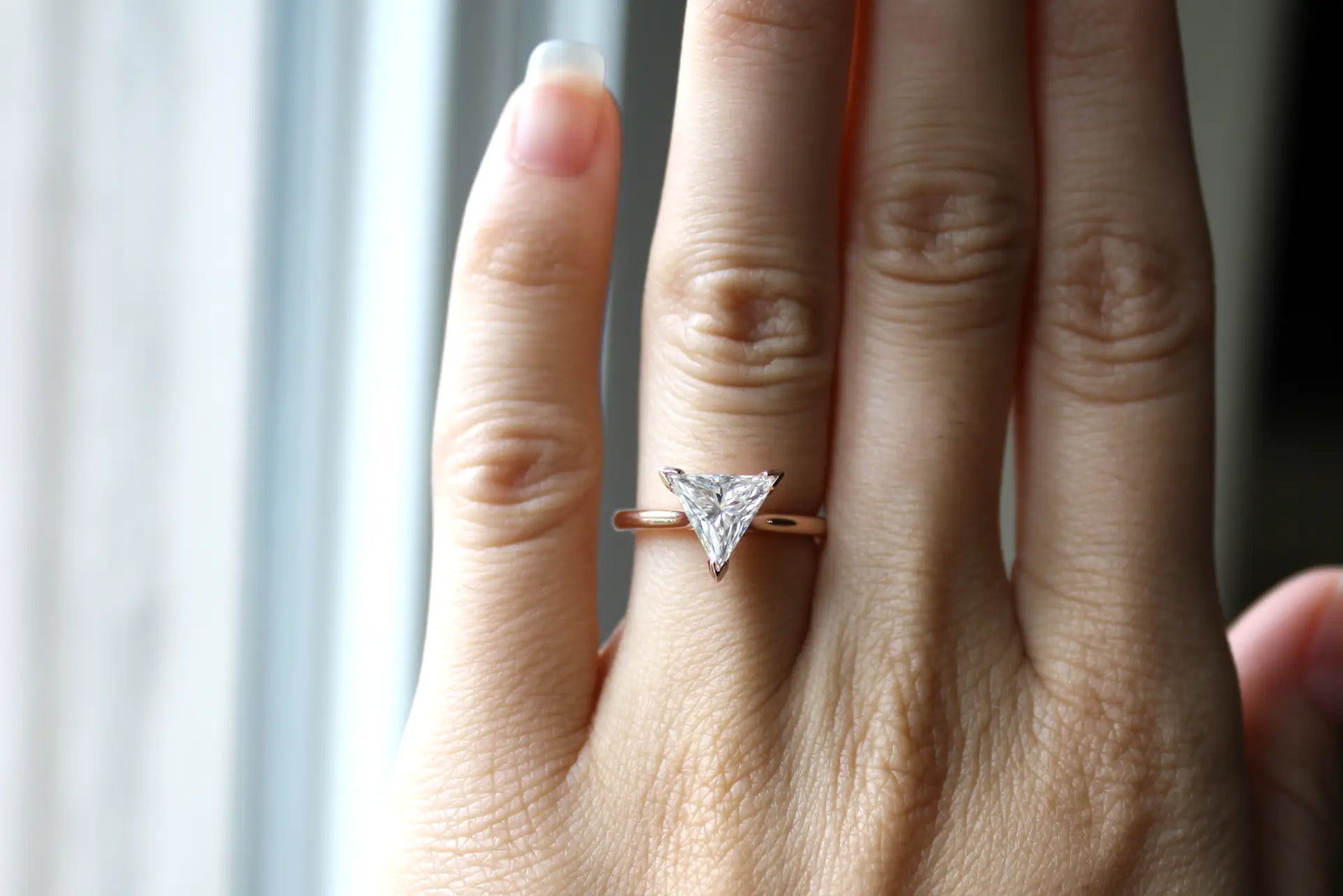 low cost designer v-prong 14k rose gold 1.5 carat triangle cut lab diamond solitaire engagement ring Quorri Made in Canada