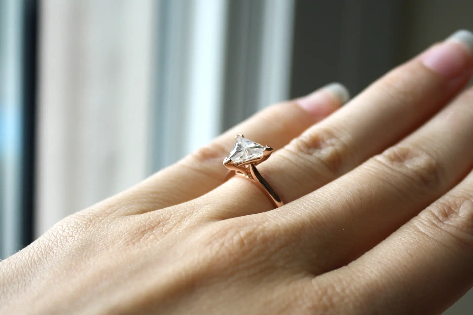 Canadian designer v-prong 14k rose gold 1.75 carat triangle cut lab grown diamond solitaire engagement ring Quorri