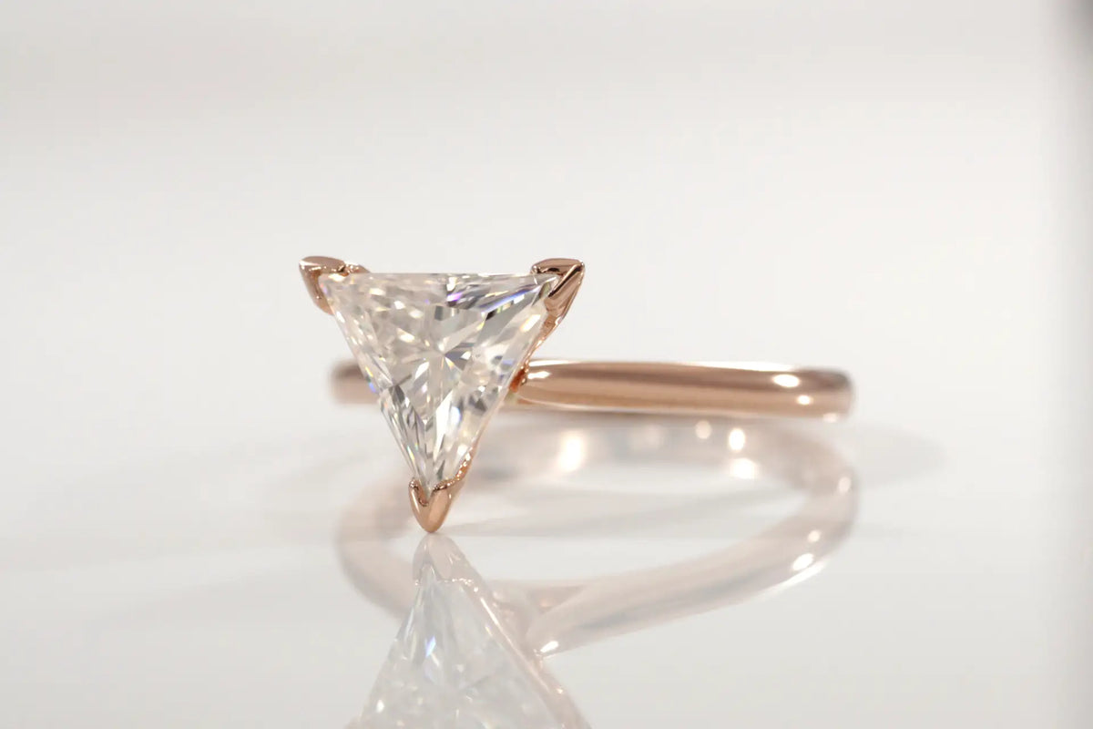 designer v-prong 18k rose gold 2 carat triangle cut lab diamond solitaire engagement ring Quorri