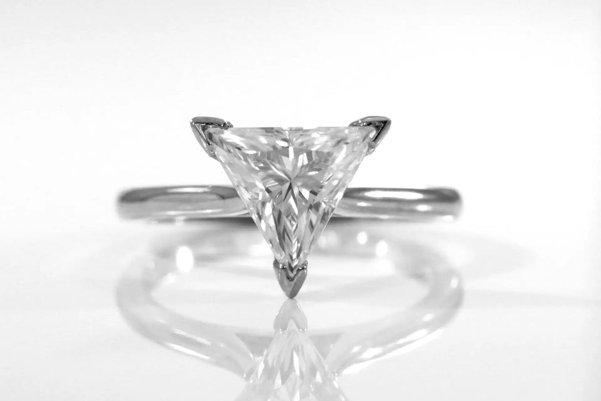 designer v-prong 18k white gold 2 carat triangle cut lab grown diamond solitaire engagement ring Quorri Canada