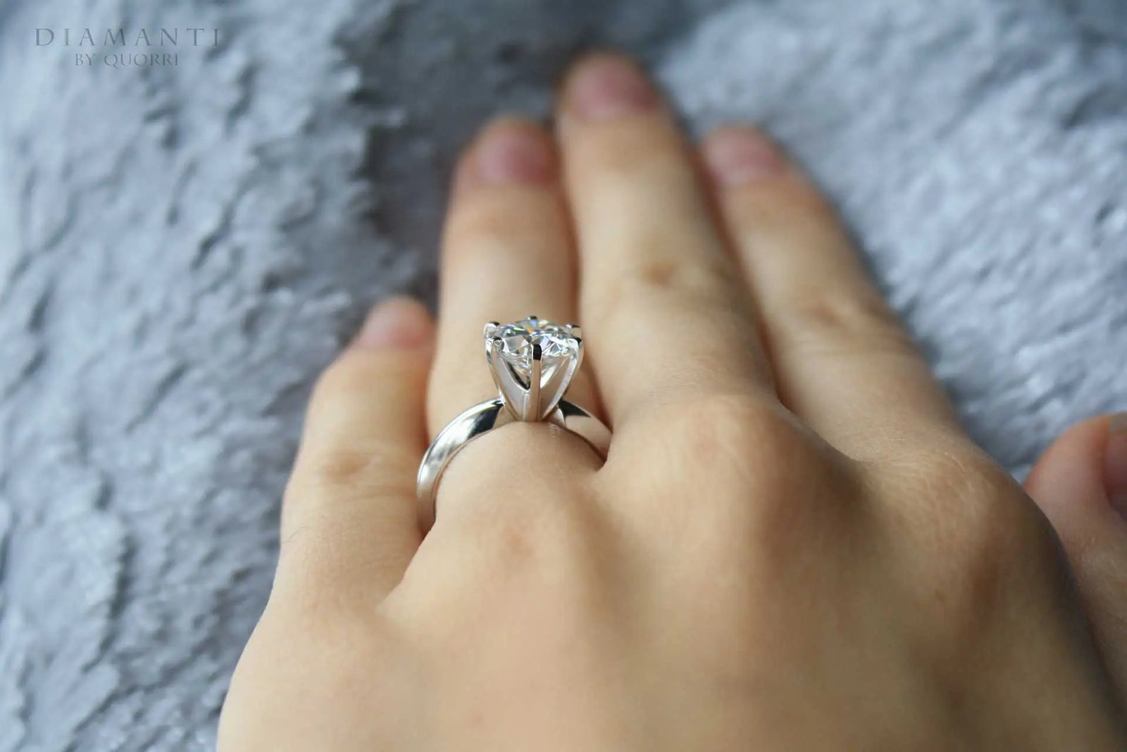 low cost six prong round lab diamond solitaire engagement ring