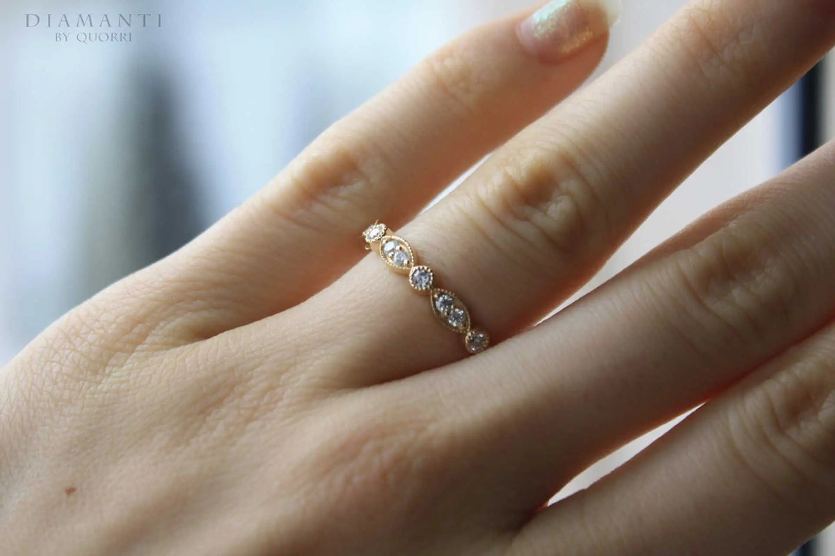 rose gold designer hand engraved mill-grain round diamond accented wedding band Quorri Canada