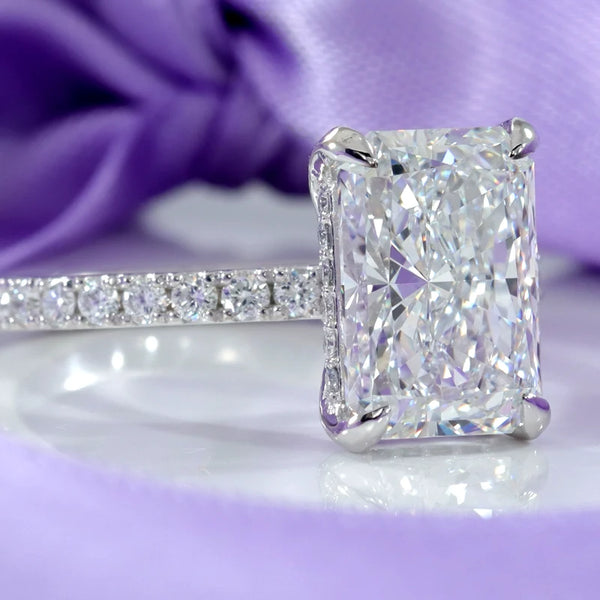 custom design for radiant cut lab diamond claw prong hidden halo accented engagement ring at Quorri