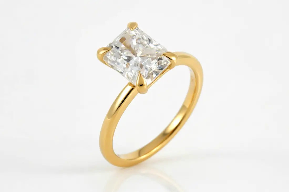 affordable claw prong 14k yellow gold 3 carat radiant lab grown diamond engagement ring Quorri