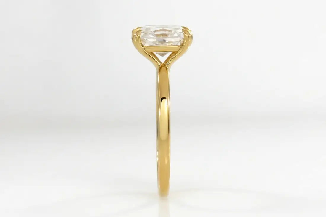 affordable claw prong yellow gold 1.5 carat emerald lab created diamond engagement ring Quorri Canada