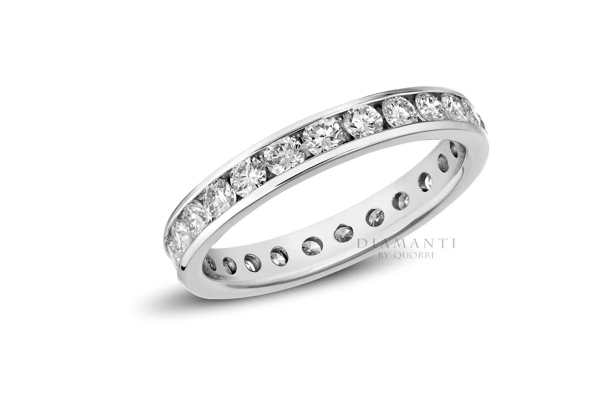 white gold designer round channel set diamond eternity anniversary and wedding band Quorri