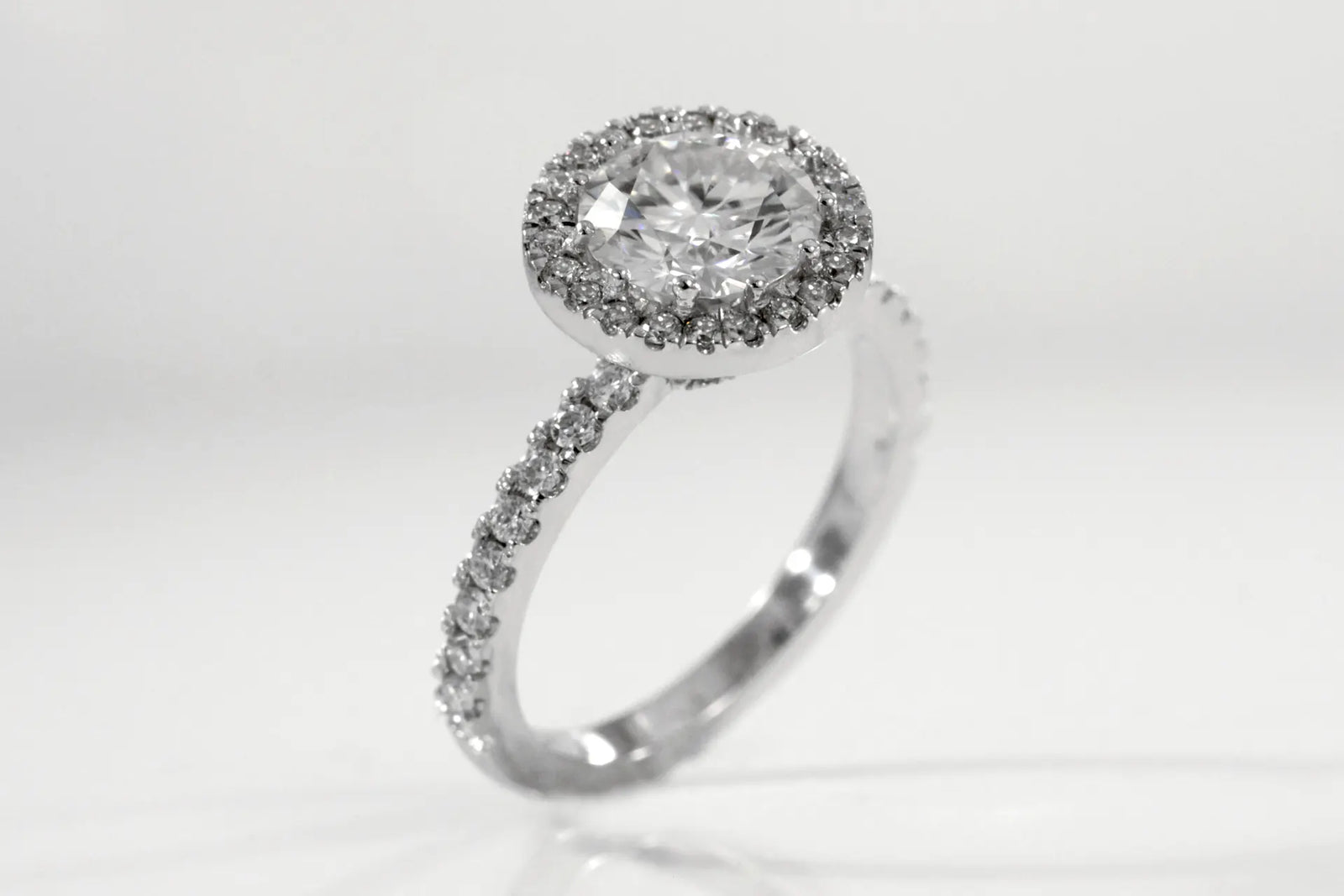 18k white gold accented invisible halo 2 carat round lab grown diamond engagement ring Quorri 