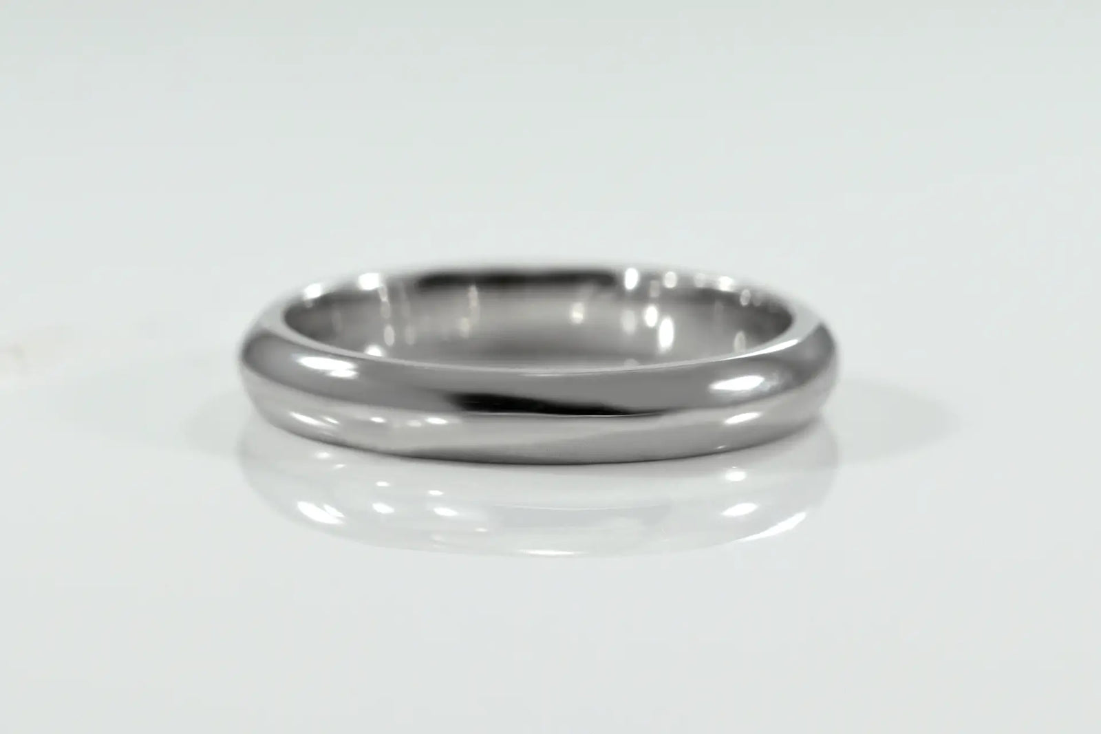 classic solid white gold half dome women's wedding band at Quorri
