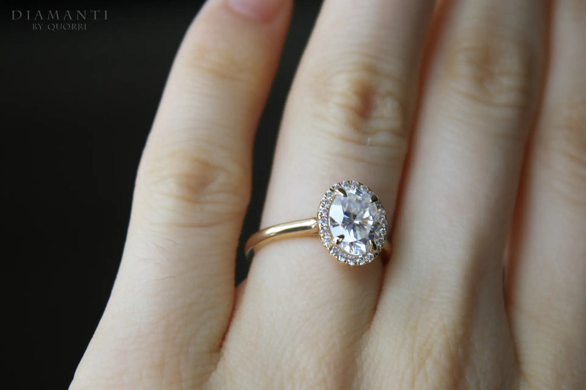 designer claw prong gold oval lab diamond engagement ring Quorri Canada