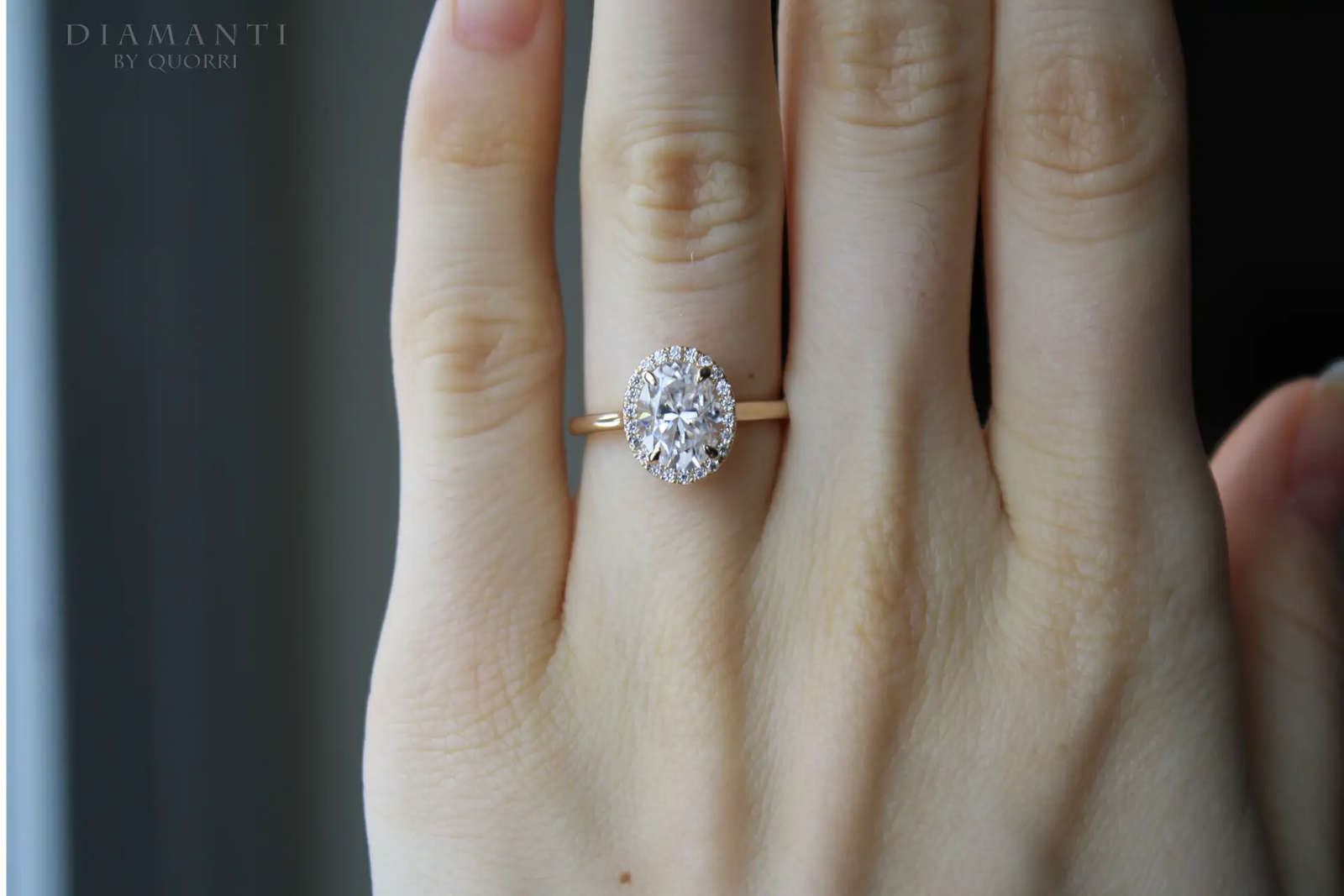 affordable claw prong two-tone gold oval lab created diamond engagement ring Quorri