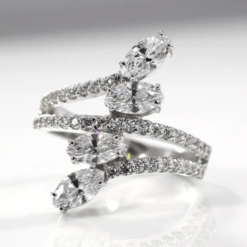 multi oval diamond snake like ring in white gold