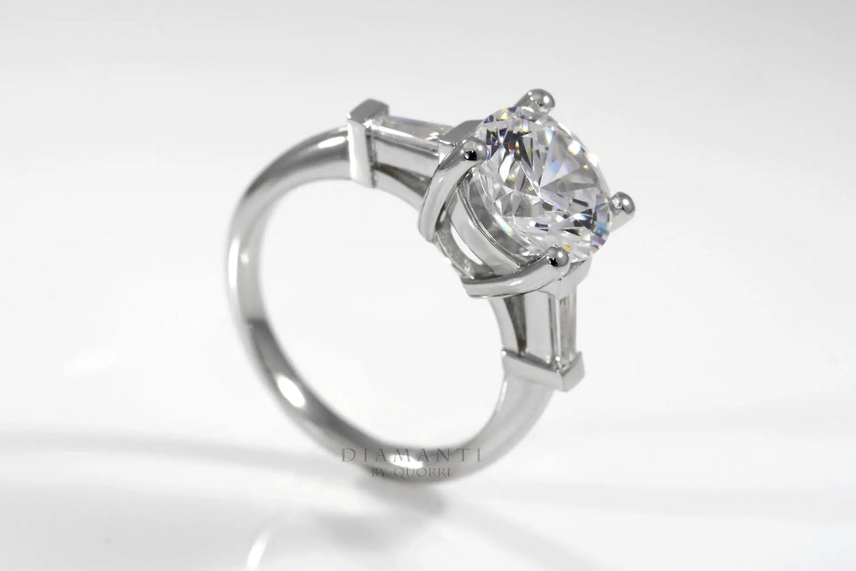 platinum three stone 2.5 carat round and baguette lab diamond engagement ring Quorri