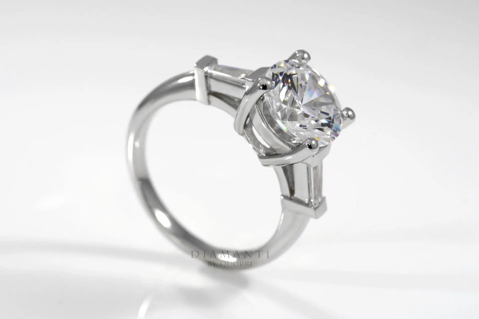 platinum three stone 2.5 carat round and baguette lab diamond engagement ring Quorri