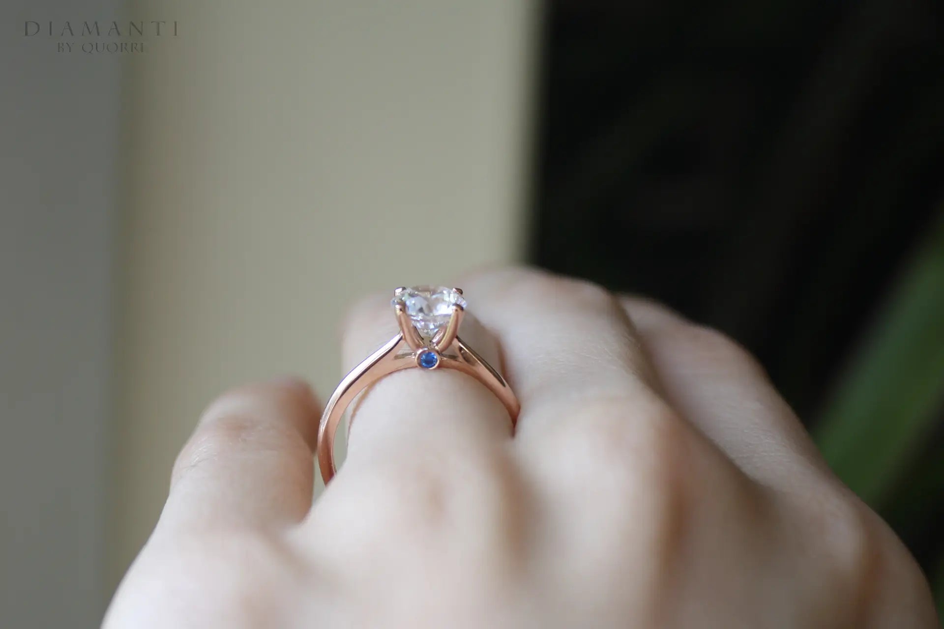 rose gold blue sapphire accented 2 carat lab diamond solitaire ring