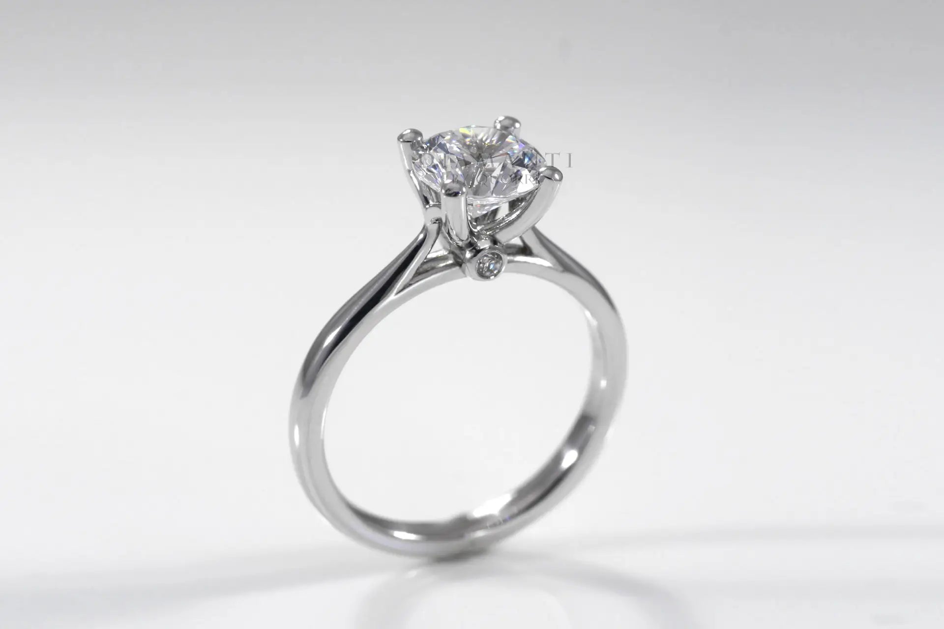 platinum affordable round lab grown diamond solitaire engagement ring