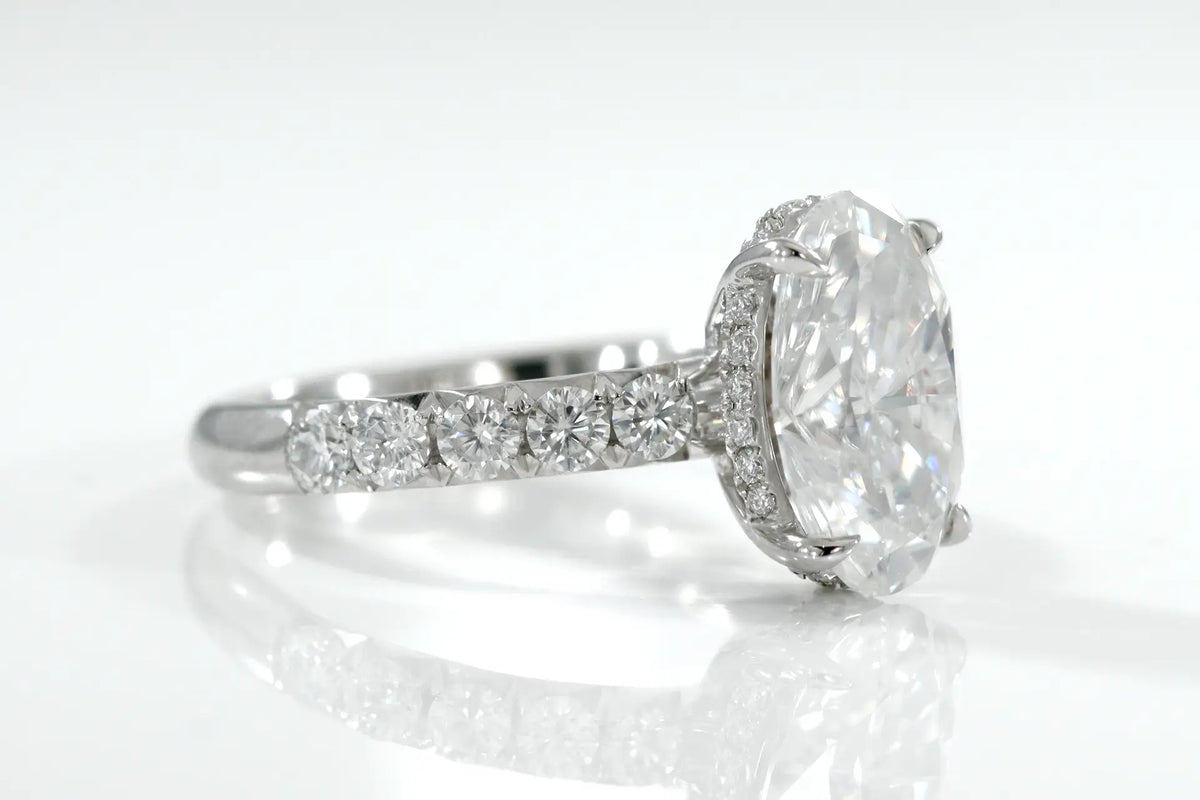 platinum  3 carat claw prong oval lab diamond hidden-halo engagement ring Quorri