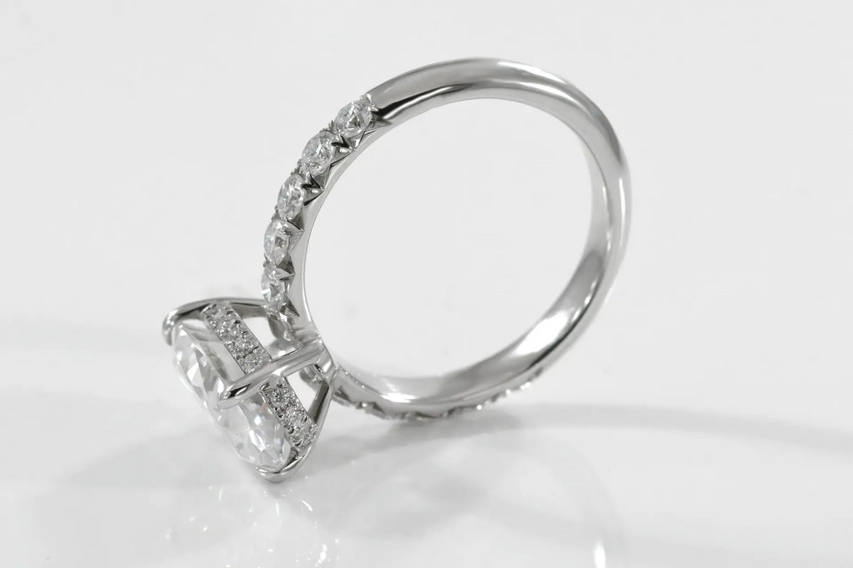 designer white gold and platinum 2.5 carat claw prong oval lab diamond hidden-halo engagement ring Quorri