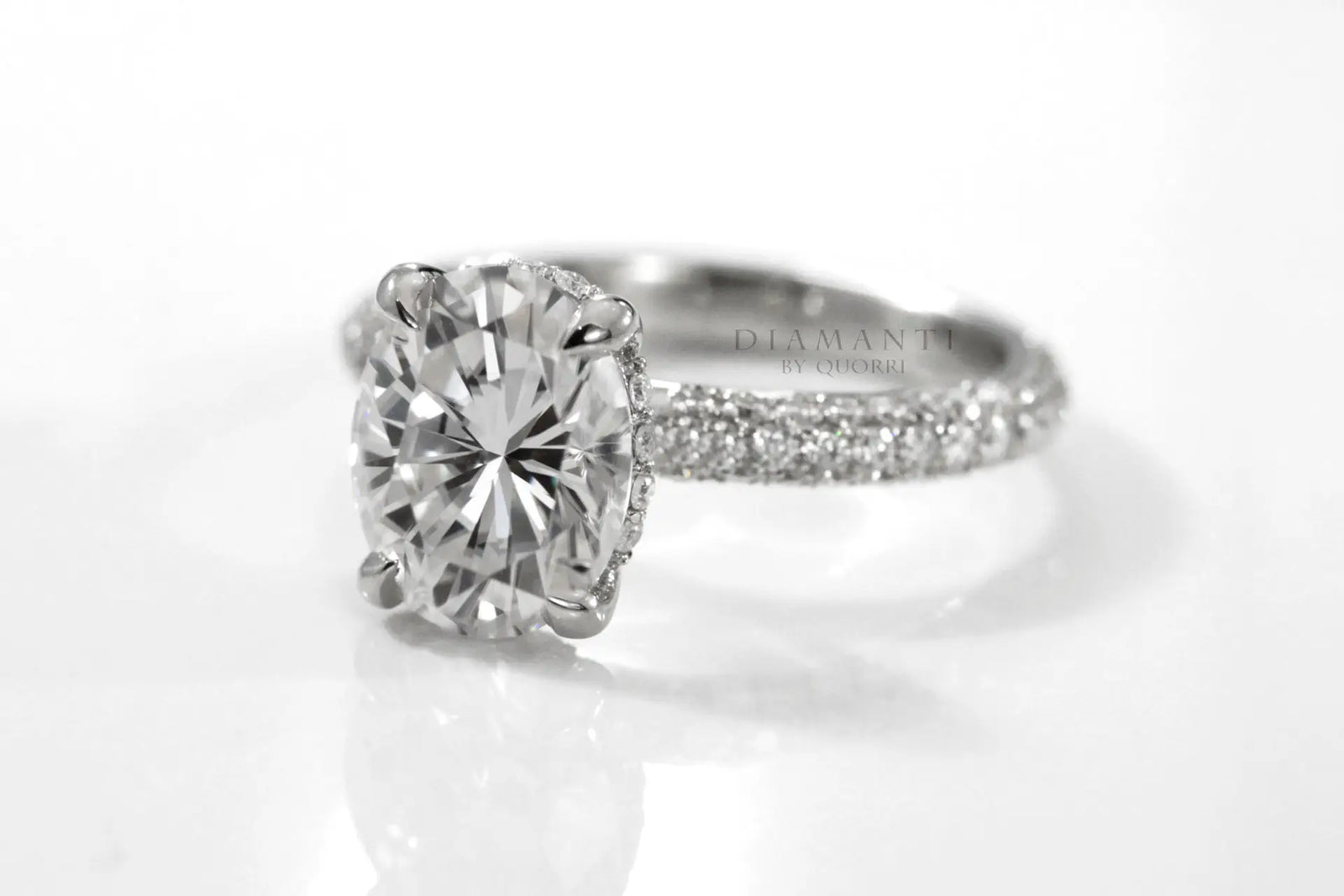 18k white gold 3 carat oval lab diamond claw prong three sided band engagement ring Quorri