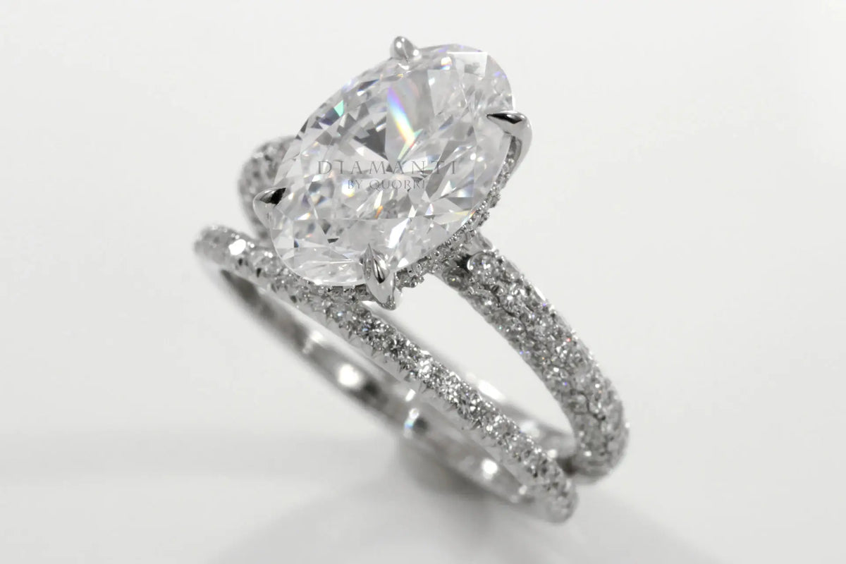 18k yellow gold 3 carat oval lab diamond claw prong three sided band engagement ring and wedding band Quorri