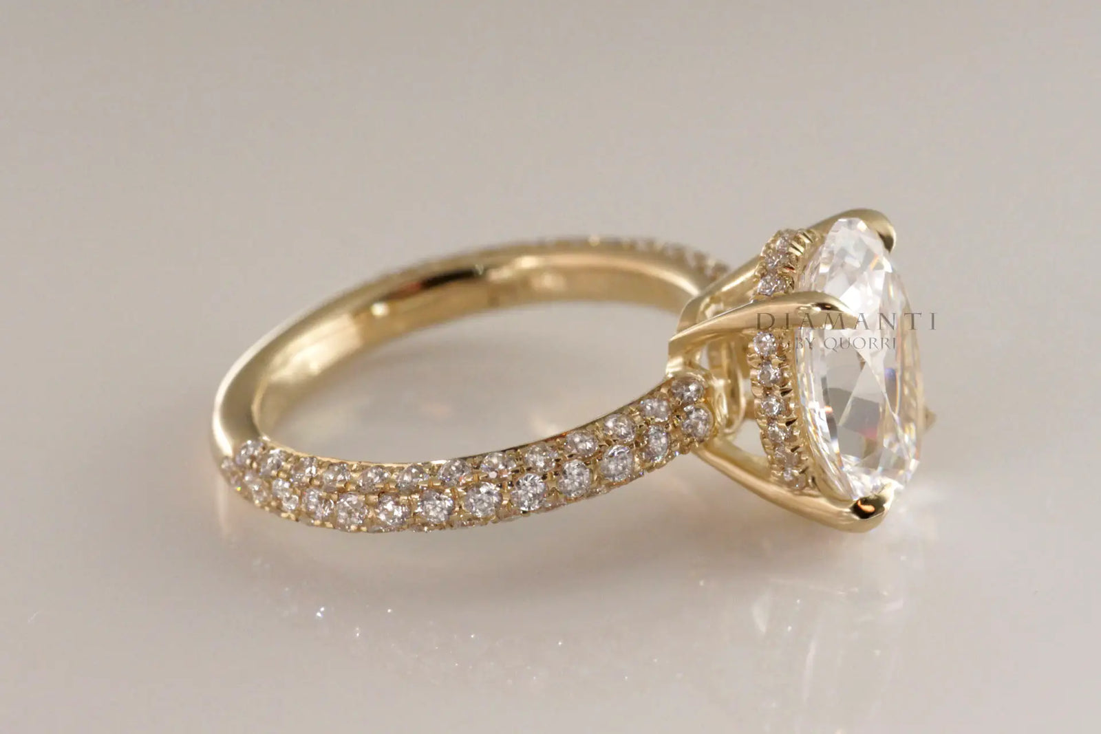 18k yellow gold 3 carat oval lab diamond claw prong three sided band engagement ring Quorri