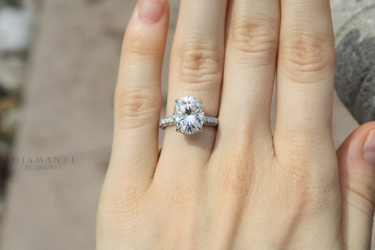 14k white gold 3 carat oval lab diamond claw prong three sided band engagement ring Quorri