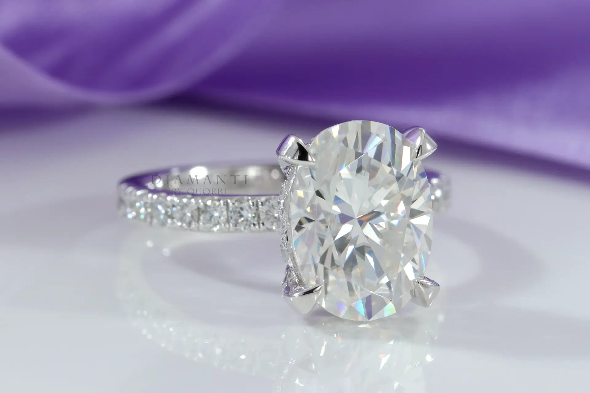 platinum 4 claw prong accented 3 carat oval lab diamond engagement ring Quorri