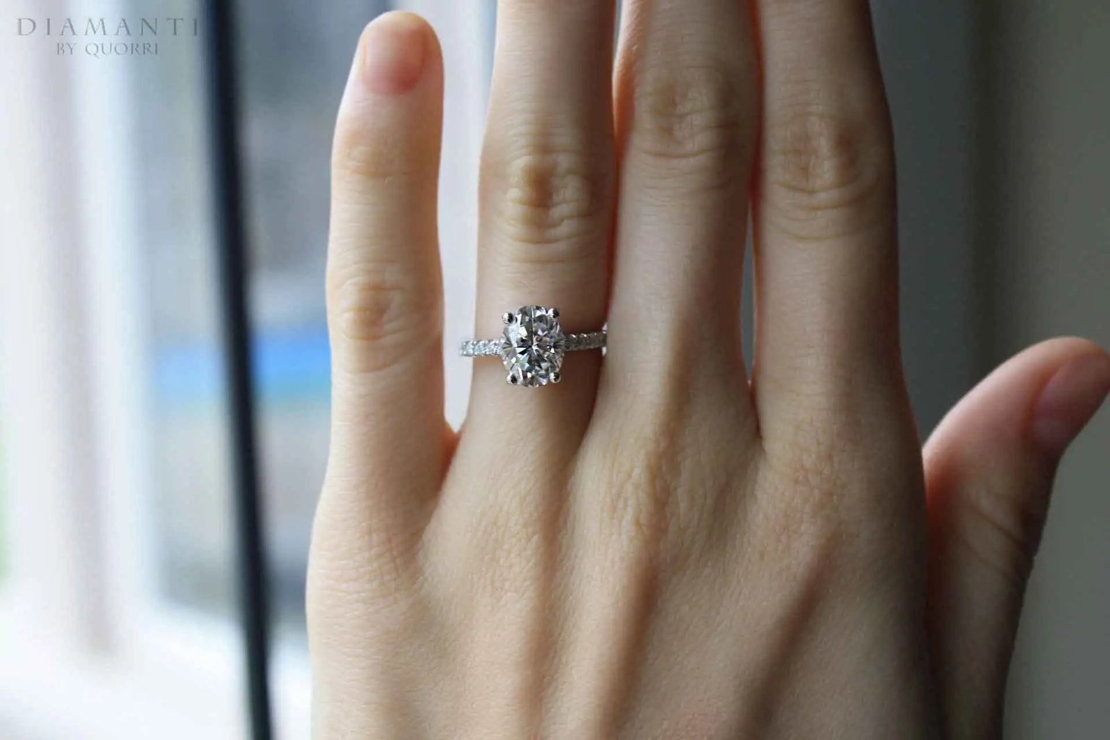 14k white gold four claw prong accented 2 carat oval lab diamond engagement ring Quorri