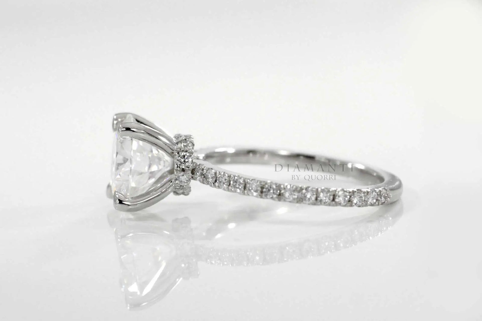 under-halo four claw prong 2 carat round lab grown diamond accented engagement ring