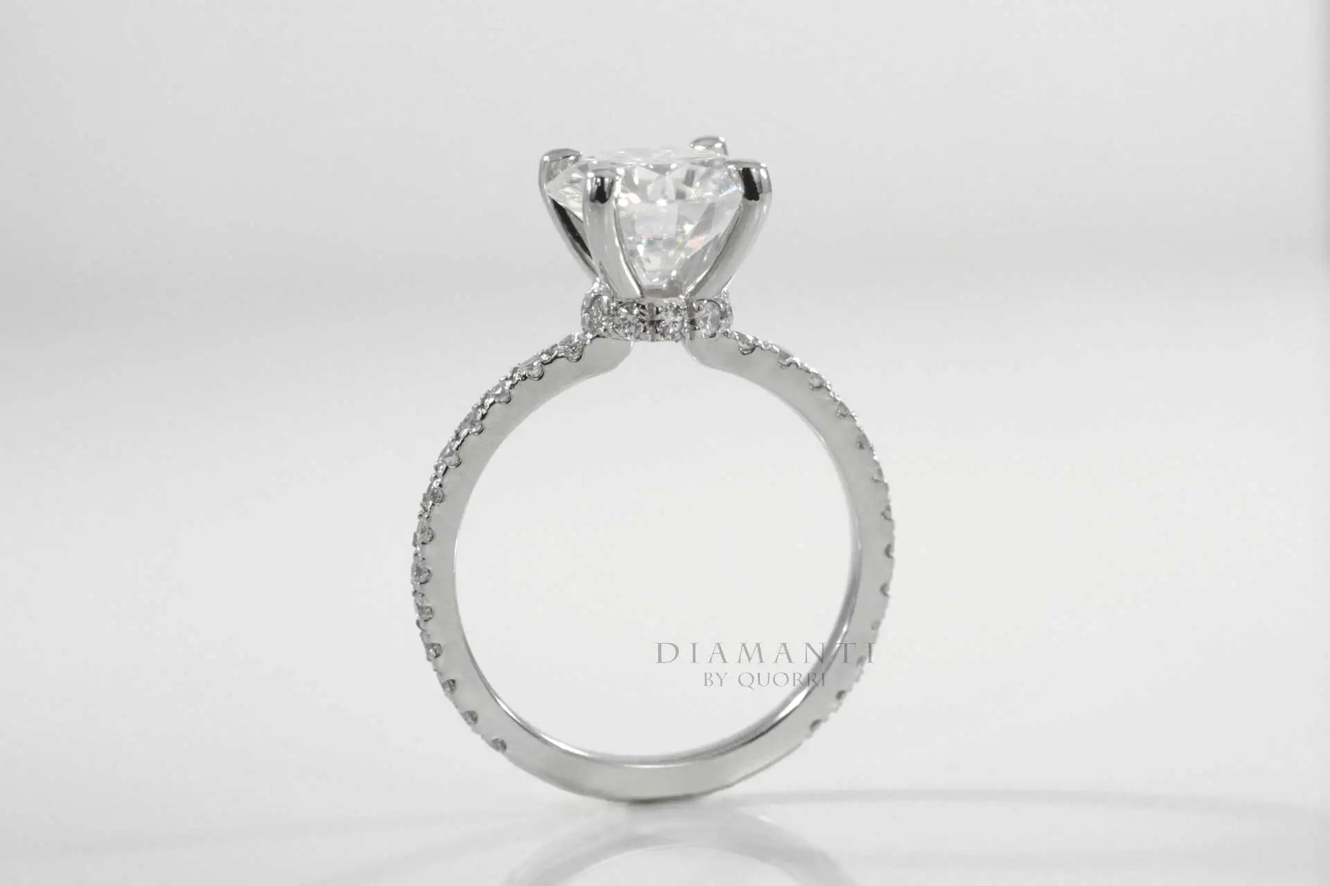 hidden halo four claw prong 2 carat round lab diamond accented engagement ring Quorri Canada