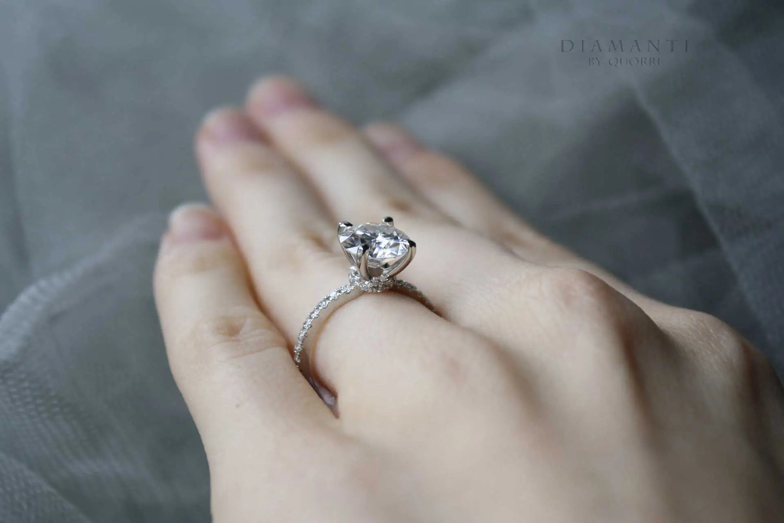 platinum hidden halo 1.5 carat round lab diamond accented engagement ring