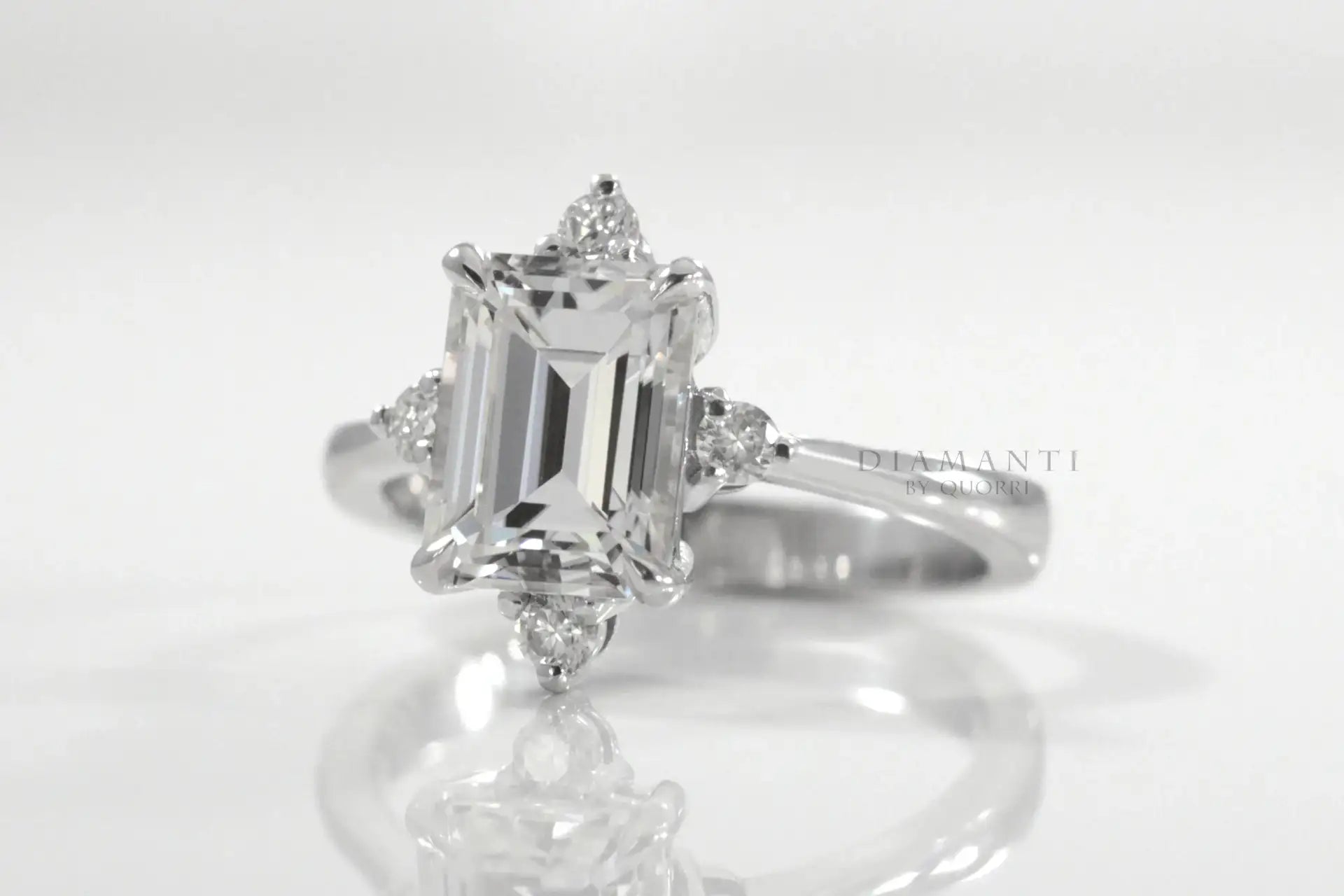 affordable platinum vintage halo 3.5 carat emerald cut lab diamond engagement ring Quorri Canada