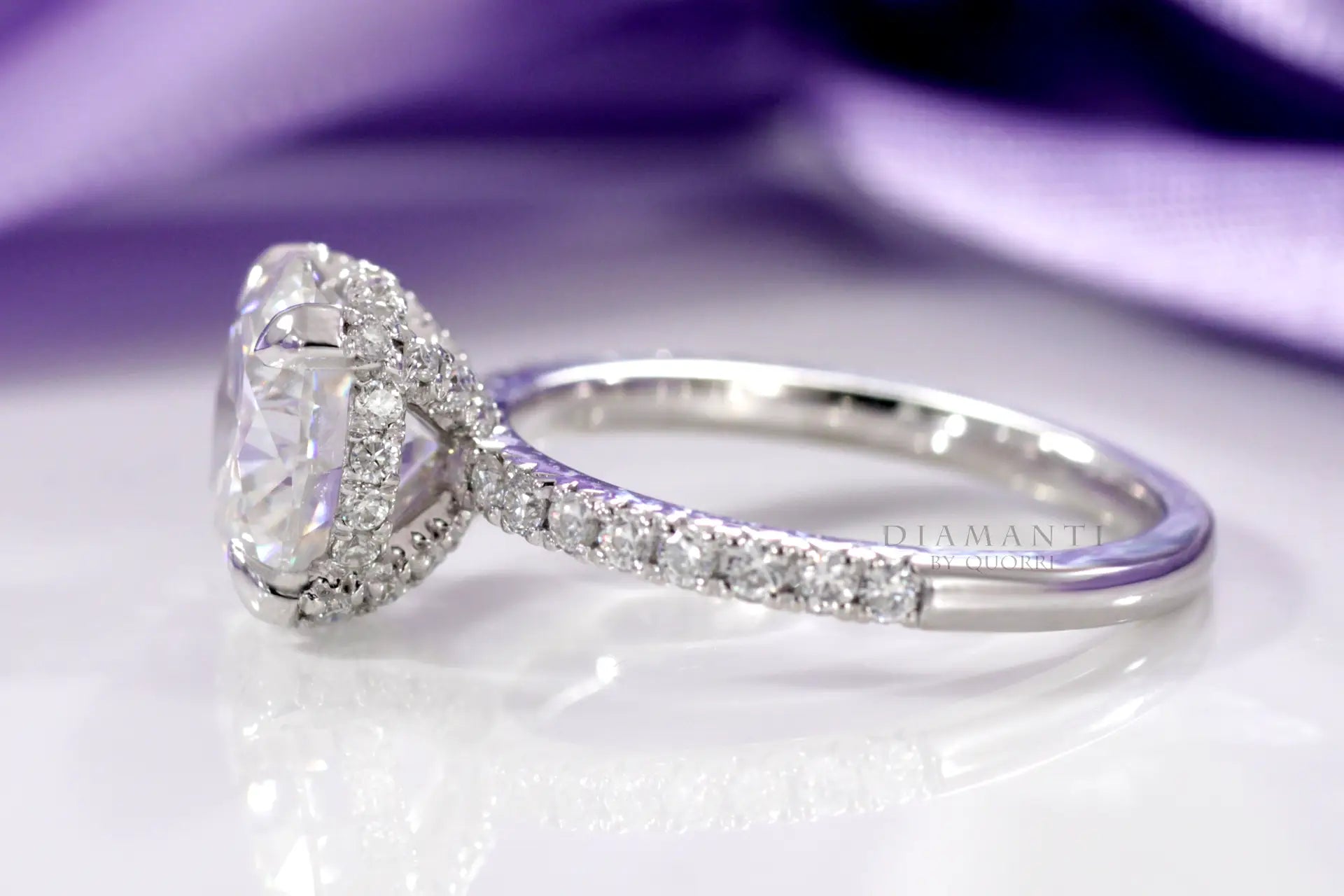 accented claw prong and under-halo round lab diamond engagement ring