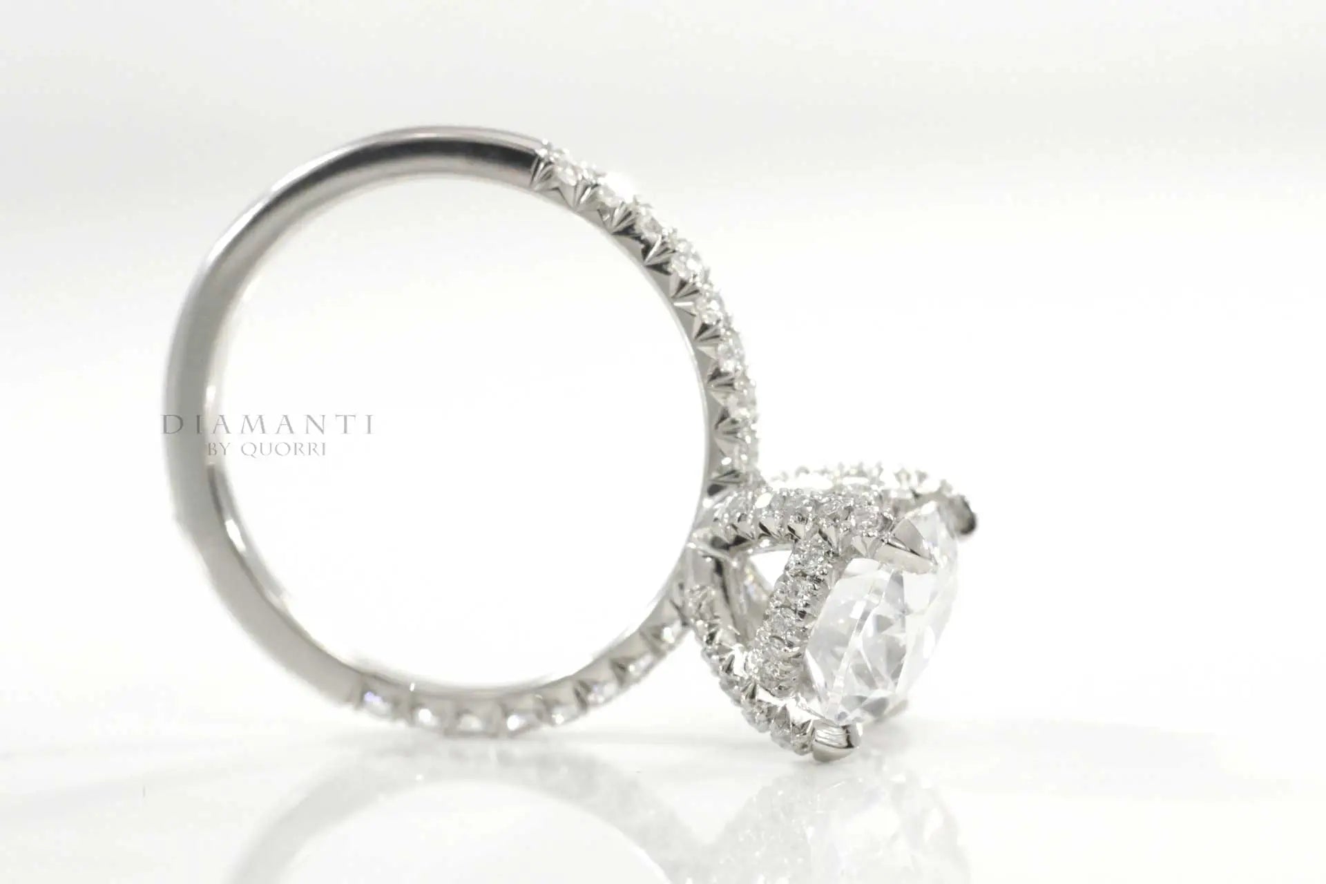 14k white gold accented claw prong and under-halo round lab grown diamond engagement ring