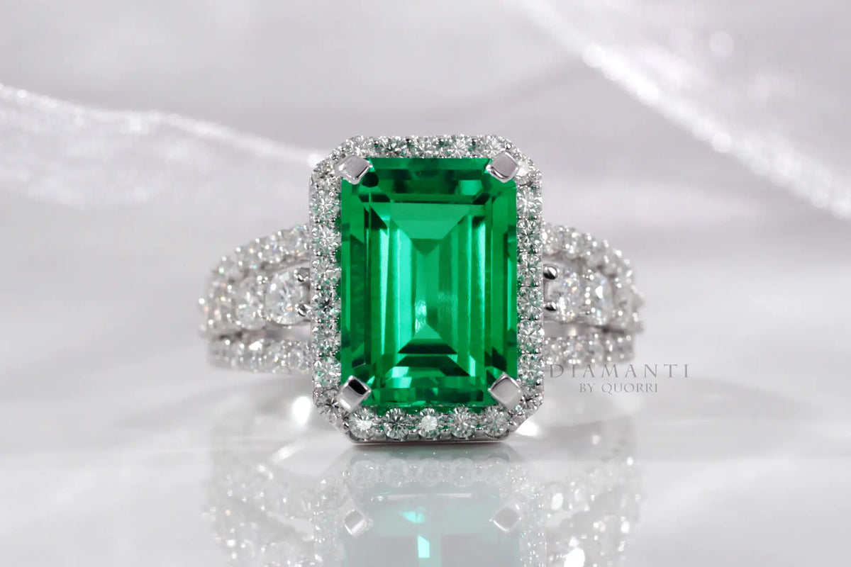 14k white gold custom cultured lab grown Colombian Zambian emerald halo engagement ring made in Canada at Quorri